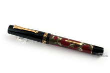 Load image into Gallery viewer, Side view of the fountain pen with the cap on.