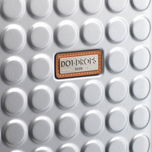 Load image into Gallery viewer, Close up to the front panel's Dot-Drops Paris logo badge.