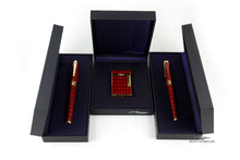 Load image into Gallery viewer, The fountain pen, lighter and rollerball arranged in their presentation boxes.
