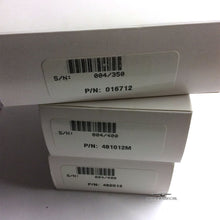 Load image into Gallery viewer, Side view of the outer white card stock boxes.