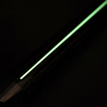 Load image into Gallery viewer, Close up to the Superluminova stripe glowing in the dark.
