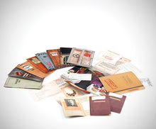 Load image into Gallery viewer, The game cards and pieces arranged on a white background.