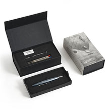 Load image into Gallery viewer, The blue Nobile multifunction pen arranged with the presentation box and contents on a white background.