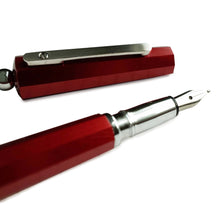Load image into Gallery viewer, Angled close up to the Moka Red fountain pen grip section and cap.