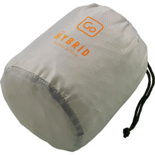 Load image into Gallery viewer, The travel pillow deflated and folded into its travel pouch.