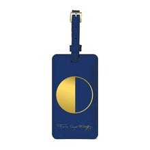 Load image into Gallery viewer, A navy blue luggage tag with a gold foil embellished circle and Wright's signature in gold at the bottom.