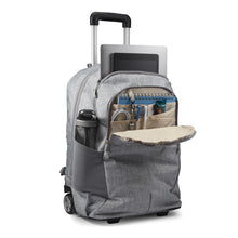 Load image into Gallery viewer, Angled front panel view of the silver wheeled backpack with stationery, accessories, electronics, and a water bottle organized in the compartments.
