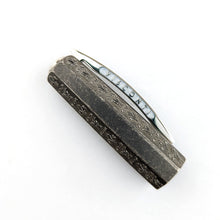 Load image into Gallery viewer, Visconti Il Magnifico Green Marble Fountain Pen, Cap Close up. The clip has the word VISCONTI engraved on the sides.