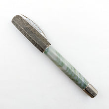 Load image into Gallery viewer, Visconti Il Magnifico Green Marble Fountain Pen, Capped. The pen is made of green marble. The cap and bottom of the pen are a darker shade of green with engraved decorations.