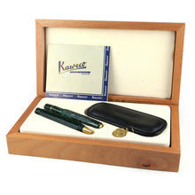 Load image into Gallery viewer, The ballpoint and fountain pen arranged with the wooden presentation box, black case, and certificate.