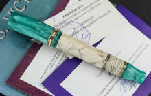 Load image into Gallery viewer, Back view of the fountain pen on top of the certificates.