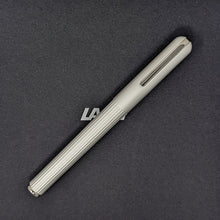 Load image into Gallery viewer, Front view of the silver rollerball pen with the cap on.