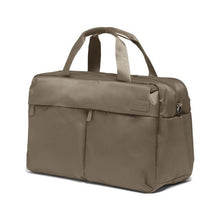 Load image into Gallery viewer, Angled front view of the taupe brown duffel bag.