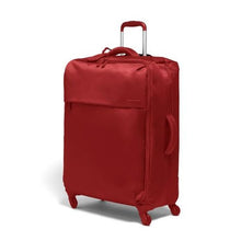 Load image into Gallery viewer, Angled front view of the red suitcase with the telescopic handle extended.