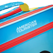 Load image into Gallery viewer, Close up to the AMERICAN TOURISTER logo on the top front of the suitcase.