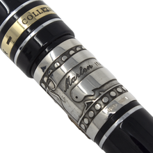 Load image into Gallery viewer, Close up to the ring with engraved Marlen logo and decorations by the grip section.