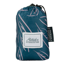 Load image into Gallery viewer, The leaf backpack folded into its packable pocket.