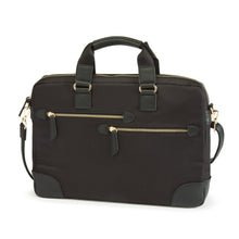 Load image into Gallery viewer, Angled front view of the slim brief. it features two zipper-closing pockets.