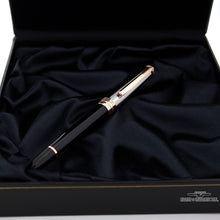 Load image into Gallery viewer, The fountain pen with the cap on in the presentation box.