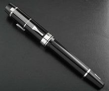 Load image into Gallery viewer, The fountain pen with the cap on.