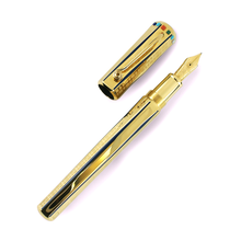 Load image into Gallery viewer, Front view of the fountain pen with the cap next to it on a white background.