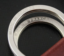 Load image into Gallery viewer, Close up to the key rings with engraved text: MADE IN FRANCE