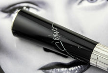 Load image into Gallery viewer, Close up to the engraved signature on the back of the cap.