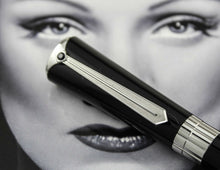 Load image into Gallery viewer, Close up to the tie-shaped cap.