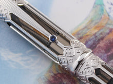 Load image into Gallery viewer, Close up the blue stone on the clip.