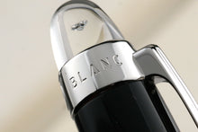 Load image into Gallery viewer, Close up to the Montblanc engraving on the clip ring at the top of the pen.