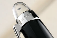 Load image into Gallery viewer, Close up to the Montblanc and model number engraved on the clip ring at the top of the pen.