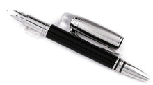 Load image into Gallery viewer, The fountain pen with the cap next to it.