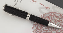 Load image into Gallery viewer, Side view of the ballpoint pen on top of the presentation box.