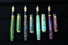 Load image into Gallery viewer, Front views of the of the fountain pens with the caps set next to each.