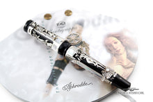 Load image into Gallery viewer, Front view of the fountain pen with the cap on.