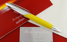 Load image into Gallery viewer, Side view of the fountain pen arranged with the presentation box and booklet.