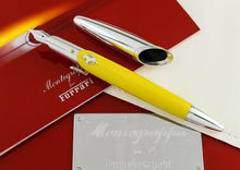 Load image into Gallery viewer, Front view of the fountain pen with the cap on, arranged with the presentation box and booklet.