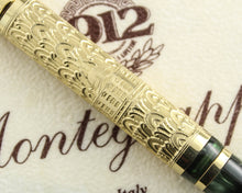Load image into Gallery viewer, Close up to the complex engraving on the barrel.