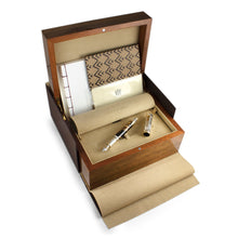 Load image into Gallery viewer, The fountain pen arranged with the packaging and contents on a white background.