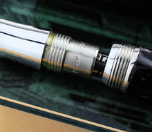 Load image into Gallery viewer, Close up to the grip section with engraved hallmarks and ITALY