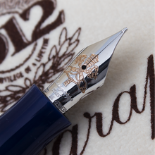 Load image into Gallery viewer, Close up to the nib with engraved decorations, Montegrappa logo, ITALY and silver hallmarks.