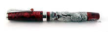 Load image into Gallery viewer, Side view of the fountain pen with the cap on.