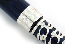 Load image into Gallery viewer, Close up to the engraved European Community logo on the cap band.