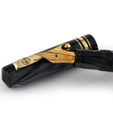 Load image into Gallery viewer, Close up of the fountain pen nib resting on the cap.