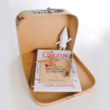 Load image into Gallery viewer, The notebook, gnome, guide, and pen arranged in the case.