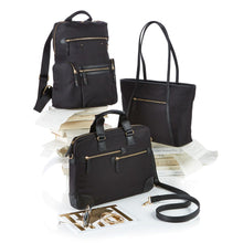 Load image into Gallery viewer, Group shot featuring different black fabric bags with leather trims, all arranged with books and other accessories. The top left features a backpack with compartments, the second one a zipper-close tote bag, and the bottom one a laptop bag.
