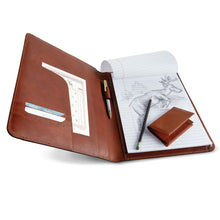 Load image into Gallery viewer, Interior view of the leather padfolio arranged with a paper pad, pencil, wallet and pen.