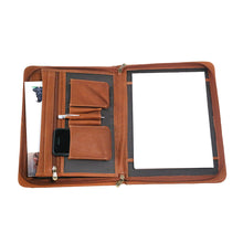 Load image into Gallery viewer, Interior view of the opened tan leather portfolio. It features a letter pad, pen, phone, and magazine arranged in the dedicated compartments.