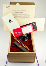 Load image into Gallery viewer, The fountain pen arranged in the wooden presentation box with the certificates, booklets, ink bottle, eye dropper,