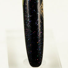 Load image into Gallery viewer, Close up to the sprinkled pieces of abalone shell on the pen barrel.